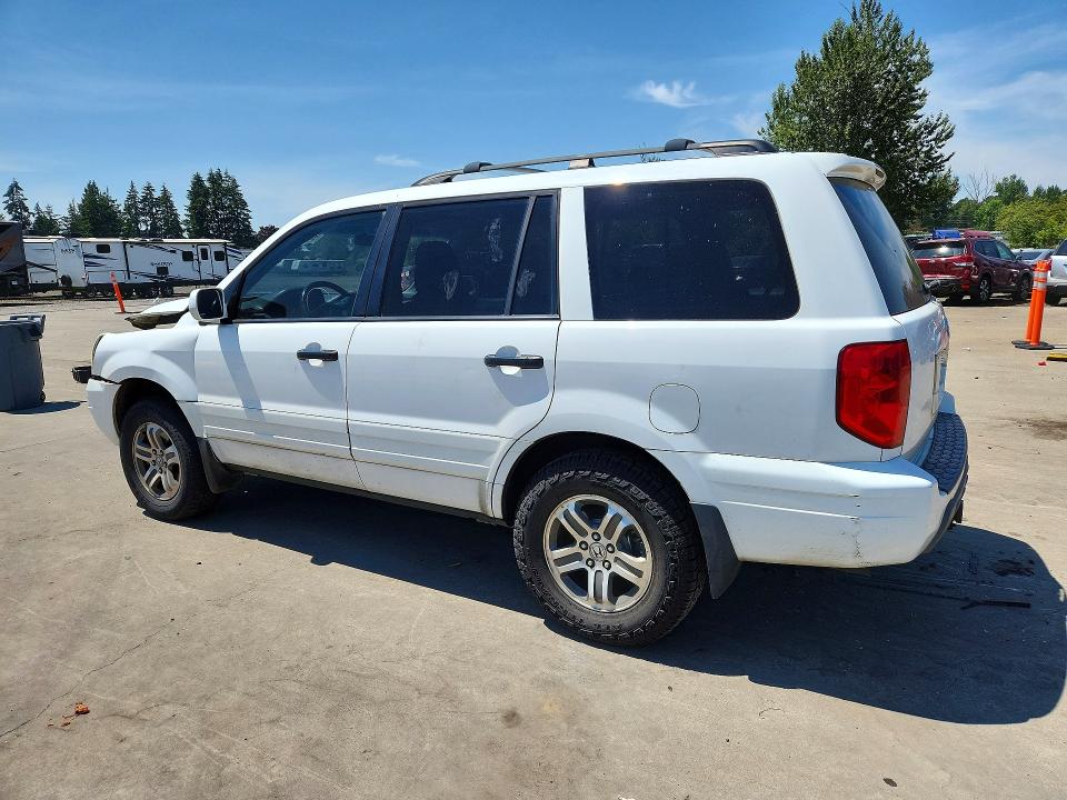 Photo 2 from auction – 2004 HONDA PILOT with VIN 2HKYF18514H548203