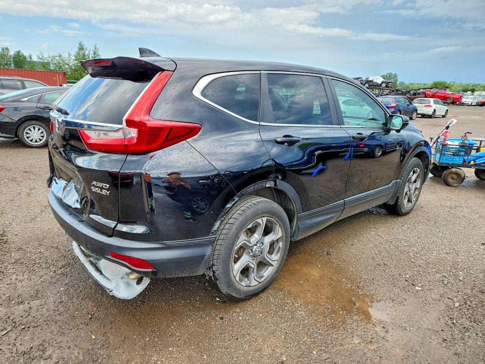 Photo 3 from auction – 2017 HONDA CR-V with VIN 2HKRW2H87HH131016