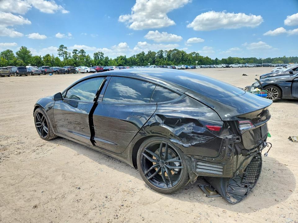 Photo 2 from auction – 2021 TESLA MODEL 3 with VIN 5YJ3E1EA0MF143740