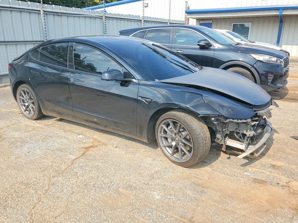 Photo 4 from auction – 2022 TESLA MODEL 3 with VIN 5YJ3E1EA2NF184842