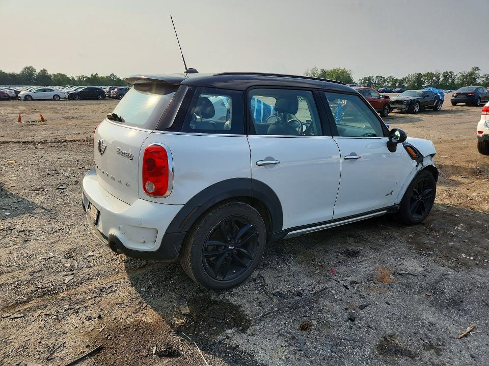 Photo 3 from auction – 2016 MINI COOPER with VIN WMWZC5C51GWU01029