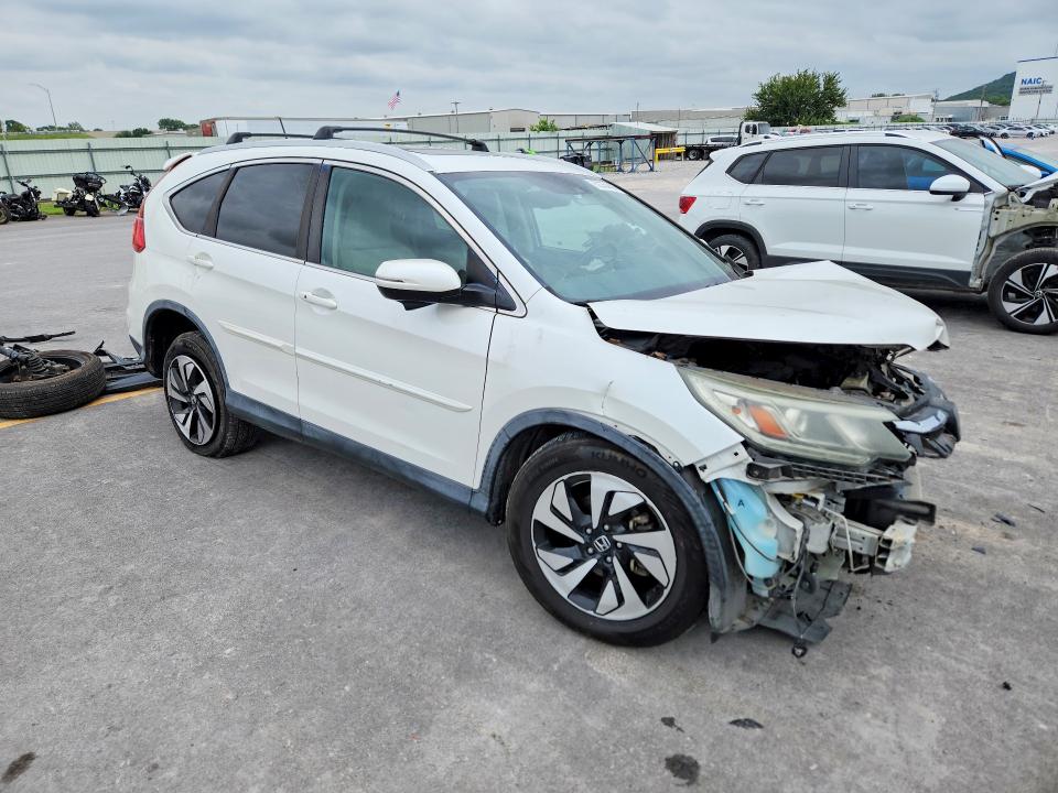 Photo 4 from auction – 2016 HONDA CR-V with VIN 5J6RM4H92GL117085