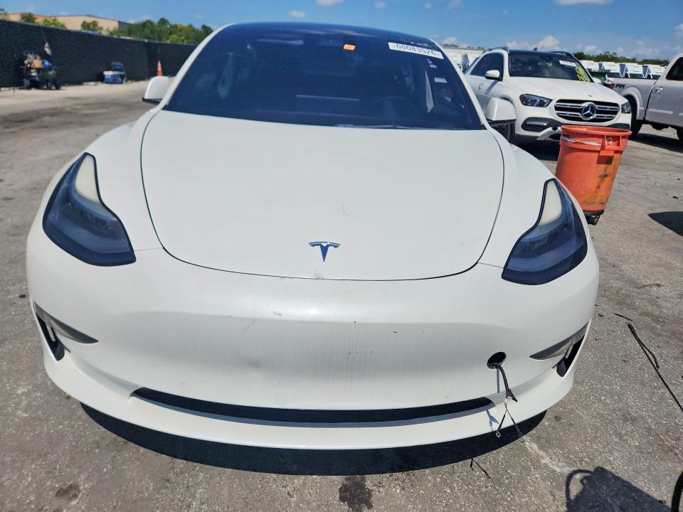 Photo 5 from auction – 2021 TESLA MODEL 3 with VIN 5YJ3E1ECXMF088456