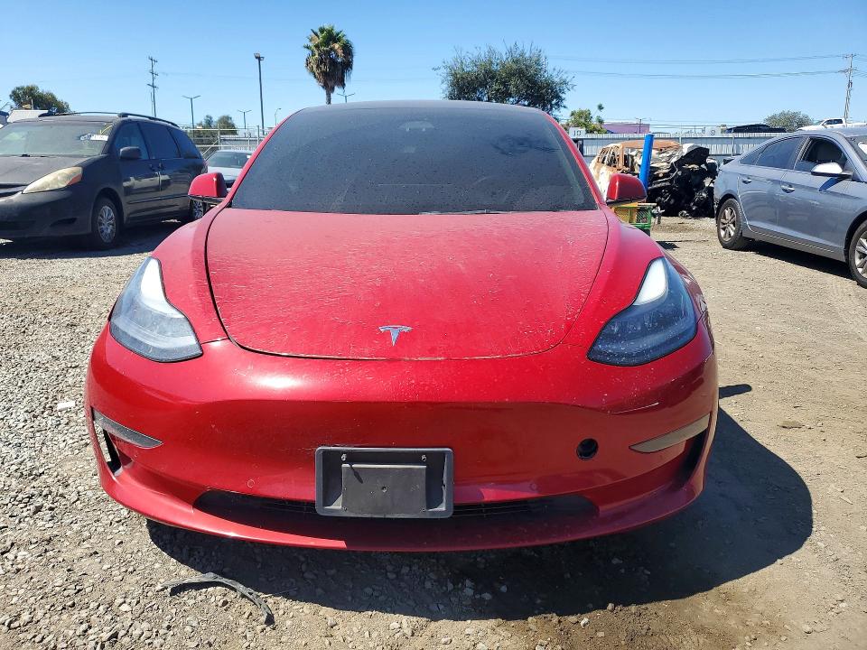 Photo 5 from auction – 2022 TESLA MODEL 3 with VIN 5YJ3E1EB0NF144641