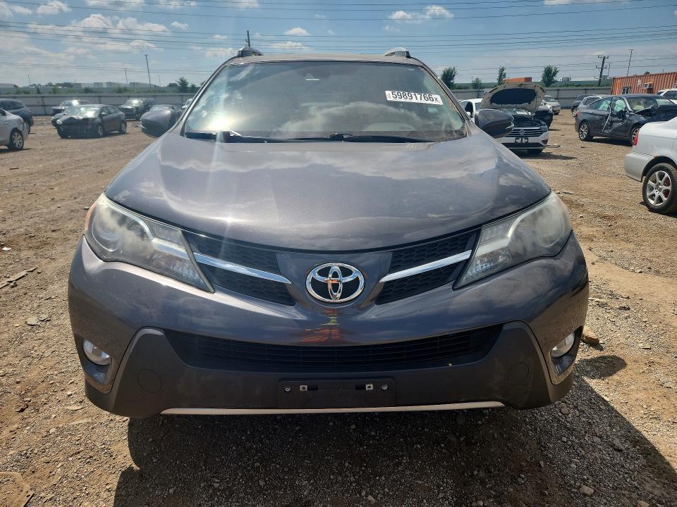 Photo 5 from auction – 2015 TOYOTA RAV4 with VIN 2T3DFREV5FW375217