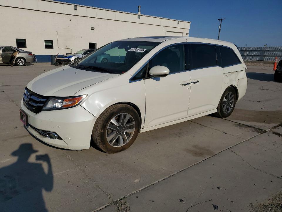HONDA ODYSSEY 2014 with VIN 5FNRL5H90EB124387 - Photo from auction