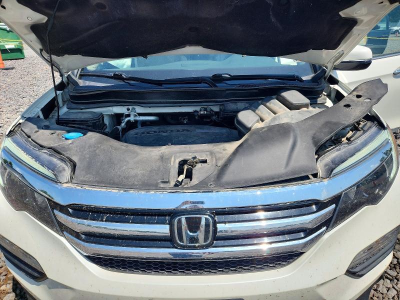 Photo 11 from auction – 2016 HONDA PILOT with VIN 5FNYF6H07GB004051