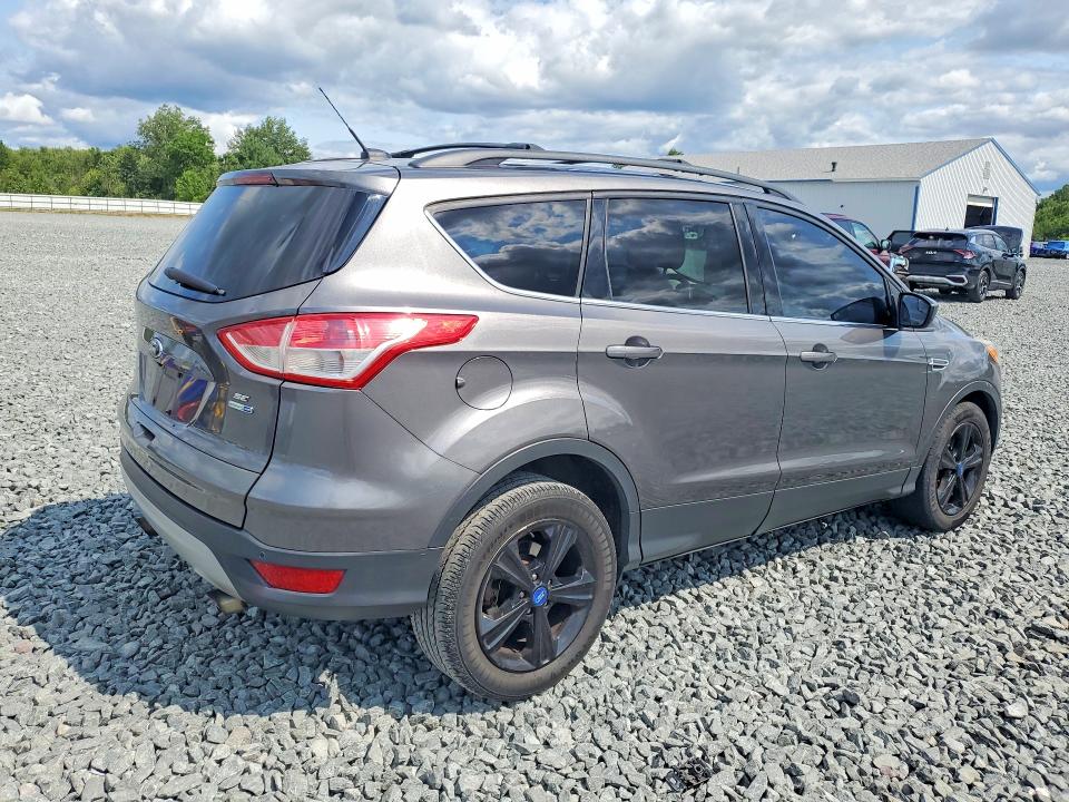 Photo 3 from auction – 2014 FORD ESCAPE with VIN 1FMCU9GX5EUA44015