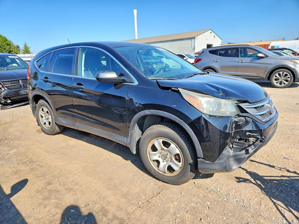 Photo 4 from auction – 2014 HONDA CR-V with VIN 2HKRM4H31EH134575