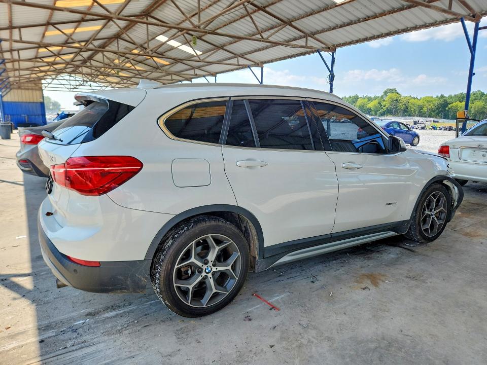 Photo 3 from auction – 2016 BMW X1 with VIN WBXHT3C34G5E56474