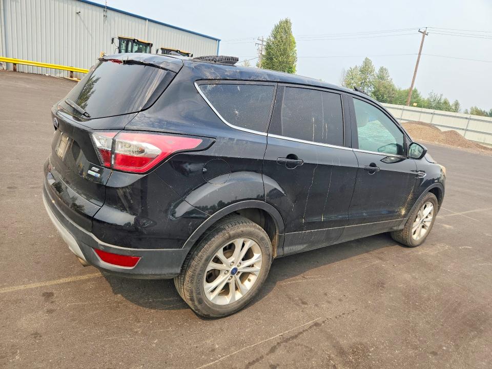 Photo 3 from auction – 2018 FORD ESCAPE with VIN 1FMCU9GD3JUA11823