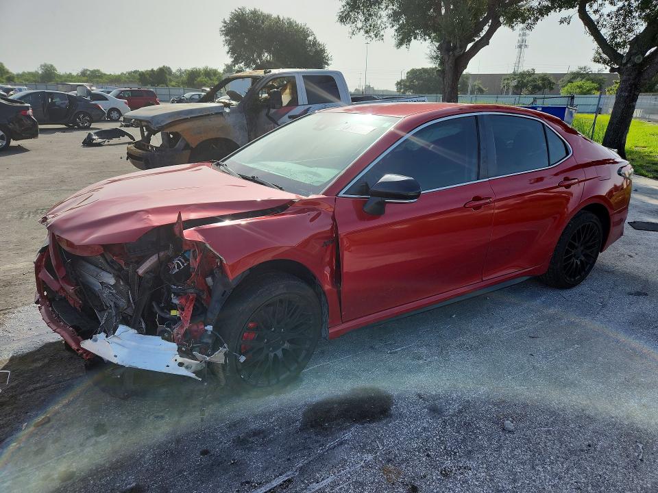 TOYOTA CAMRY 2022 with VIN 4T1G11AK2NU042988 - Photo from auction