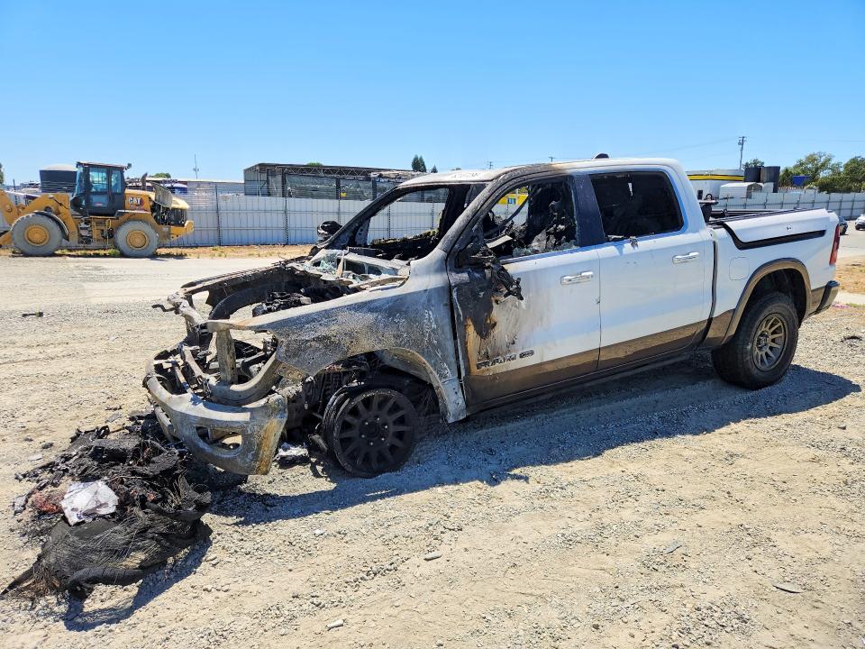 RAM 1500 2022 with VIN 1C6SRFKM4NN188203 - Photo from auction