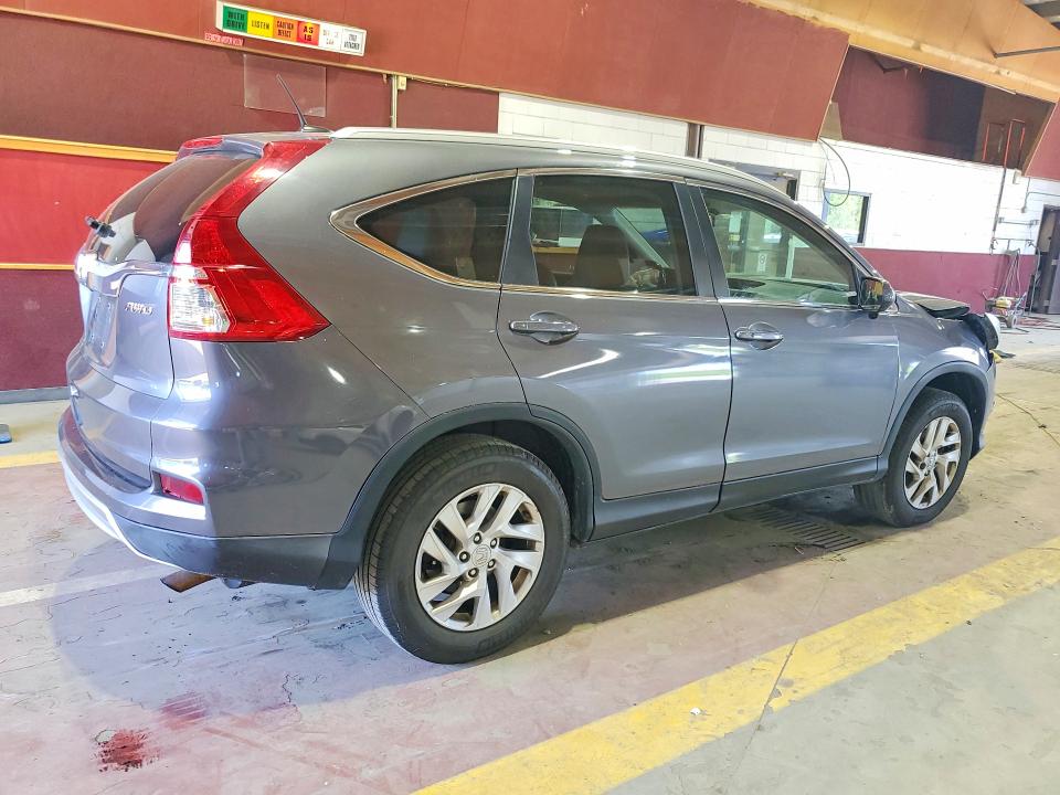 Photo 3 from auction – 2015 HONDA CR-V with VIN 2HKRM4H73FH647248