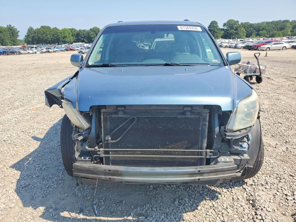 Фото 5 с аукциона – 2006 HONDA PILOT с VIN 5FNYF185X6B009497