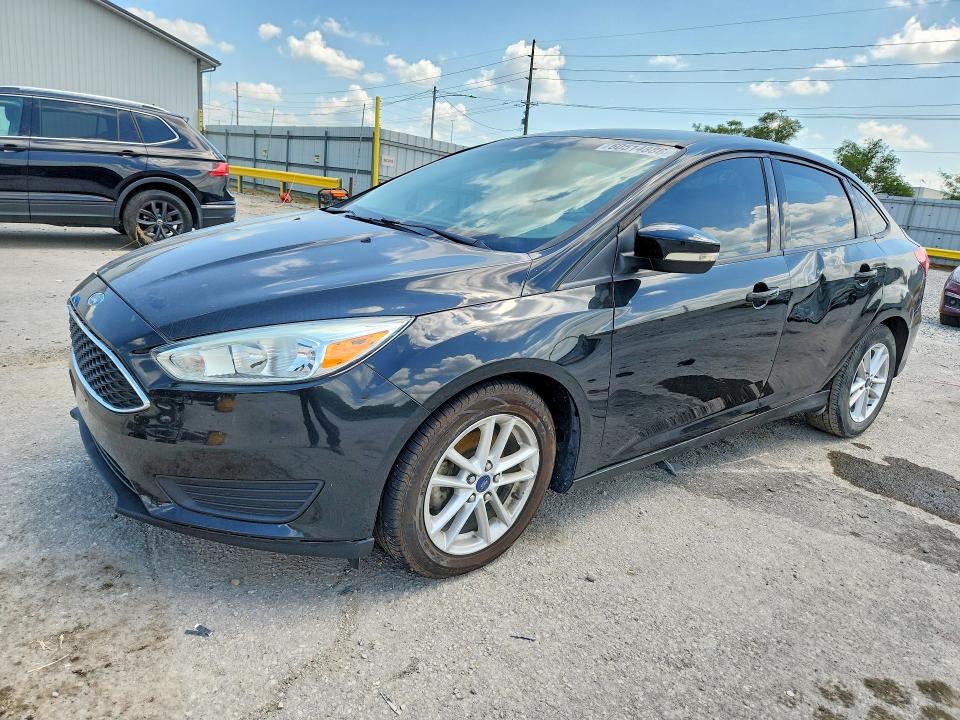 FORD FOCUS 2015 with VIN 1FADP3F25FL255652 - Photo from auction