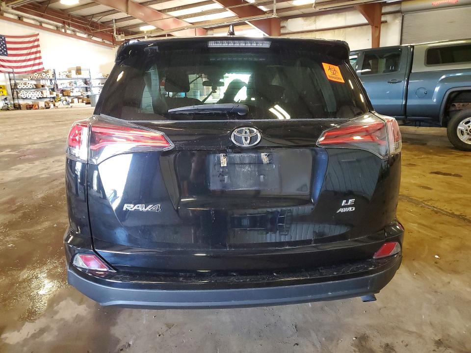 Photo 6 from auction – 2018 TOYOTA RAV4 with VIN 2T3BFREV0JW765352
