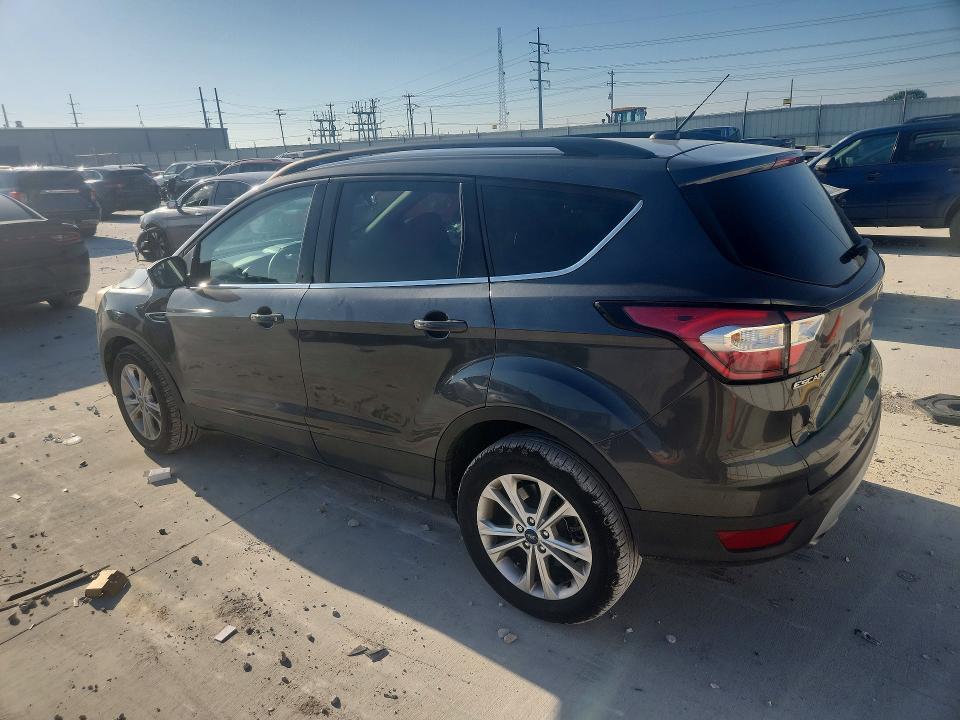 Photo 2 from auction – 2018 FORD ESCAPE with VIN 1FMCU0GD0JUC33912