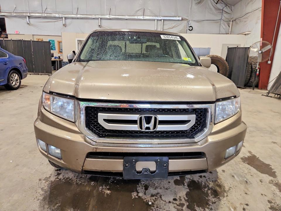 Photo 5 from auction – 2009 HONDA RIDGELINE with VIN 5FPYK16519B104525