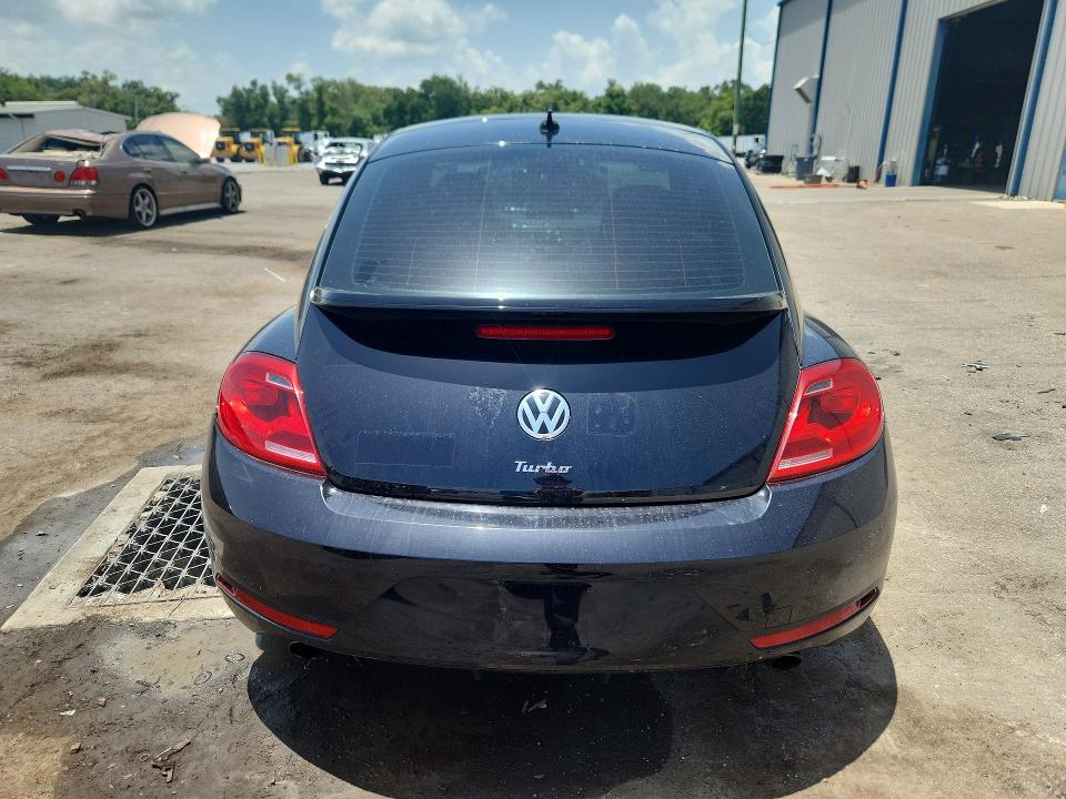 Photo 6 from auction – 2014 VOLKSWAGEN BEETLE with VIN 3VWVT7AT5EM638468