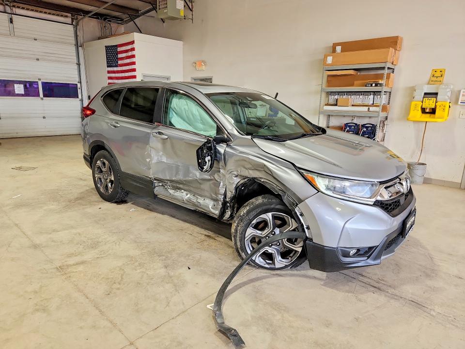 Photo 4 from auction – 2019 HONDA CR-V with VIN 5J6RW2H53KL010762