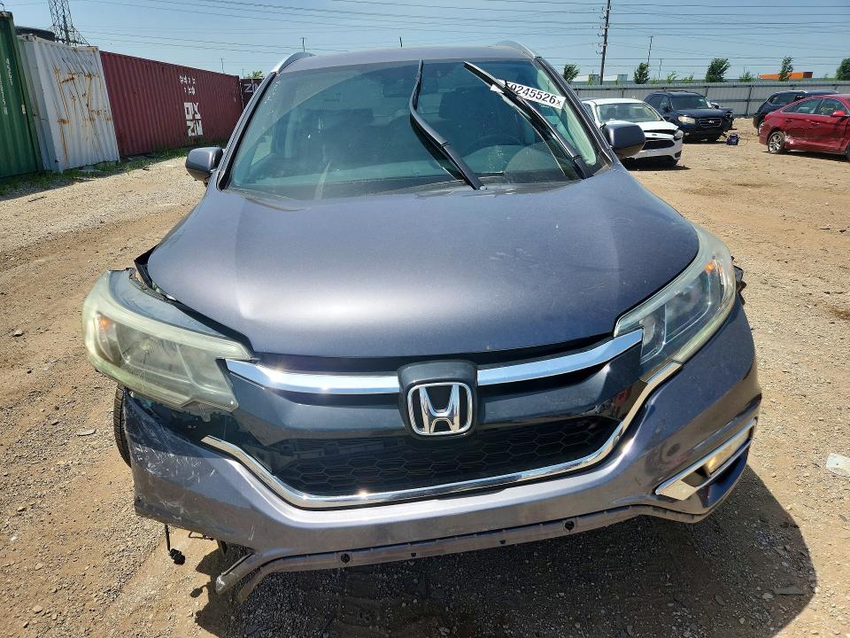 Photo 5 from auction – 2015 HONDA CR-V with VIN 5J6RM4H77FL081858