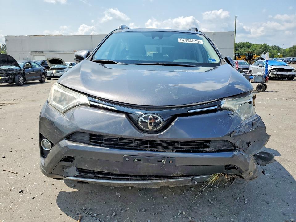 Photo 5 from auction – 2017 TOYOTA RAV4 with VIN JTMRFREV4HJ136717