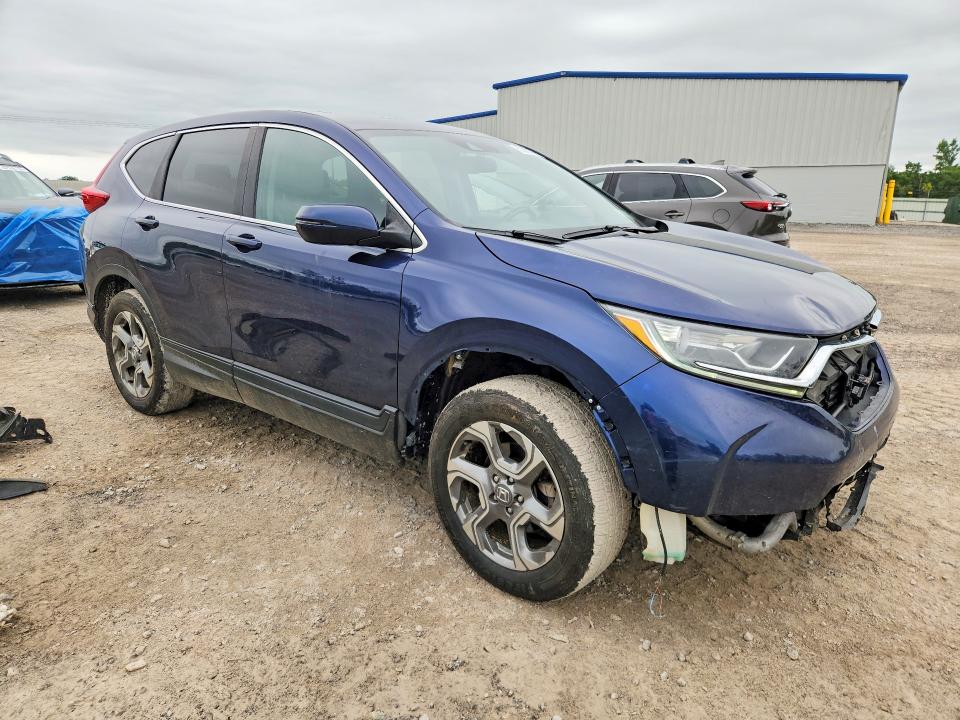 Photo 4 from auction – 2018 HONDA CR-V with VIN 7FARW2H85JE080107