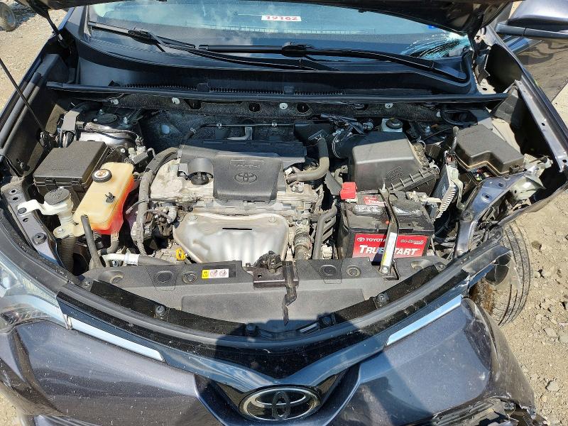 Photo 12 from auction – 2018 TOYOTA RAV4 with VIN JTMWFREV2JJ187528