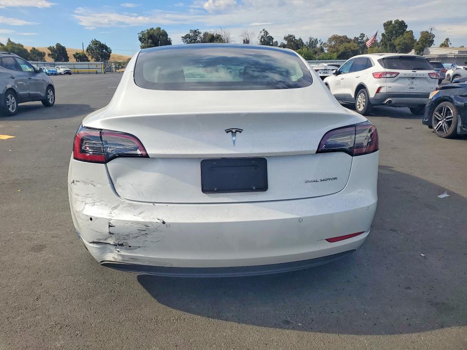 Photo 6 from auction – 2021 TESLA MODEL 3 with VIN 5YJ3E1EB2MF863064