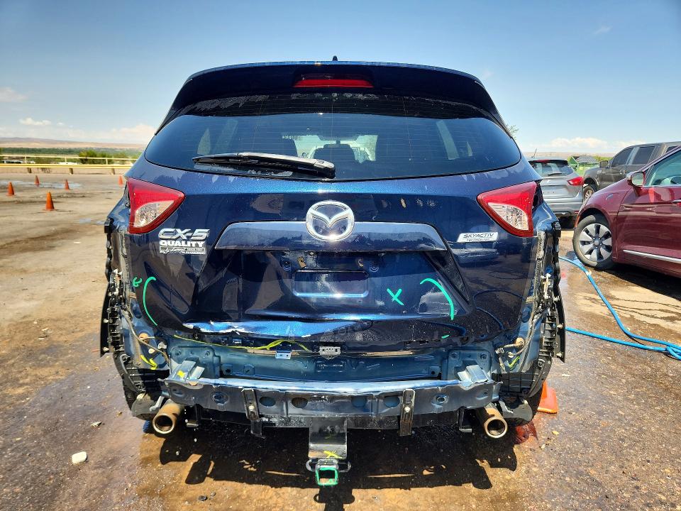 Photo 6 from auction – 2014 MAZDA CX-5 with VIN JM3KE2CY6E0394500