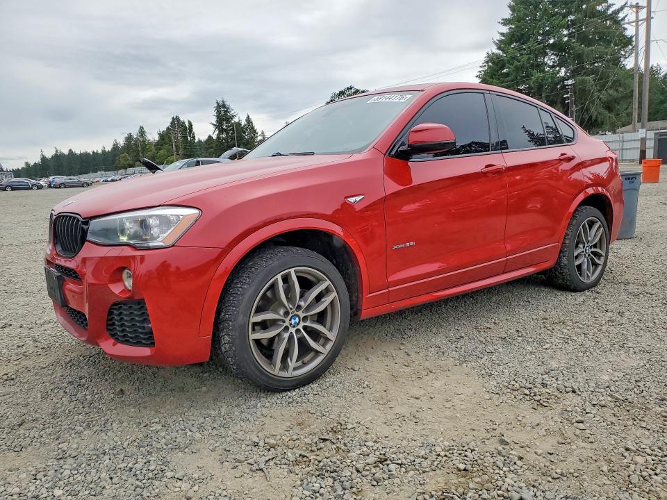 BMW X4 2015 with VIN 5UXXW5C58F0E87413 - Photo from auction