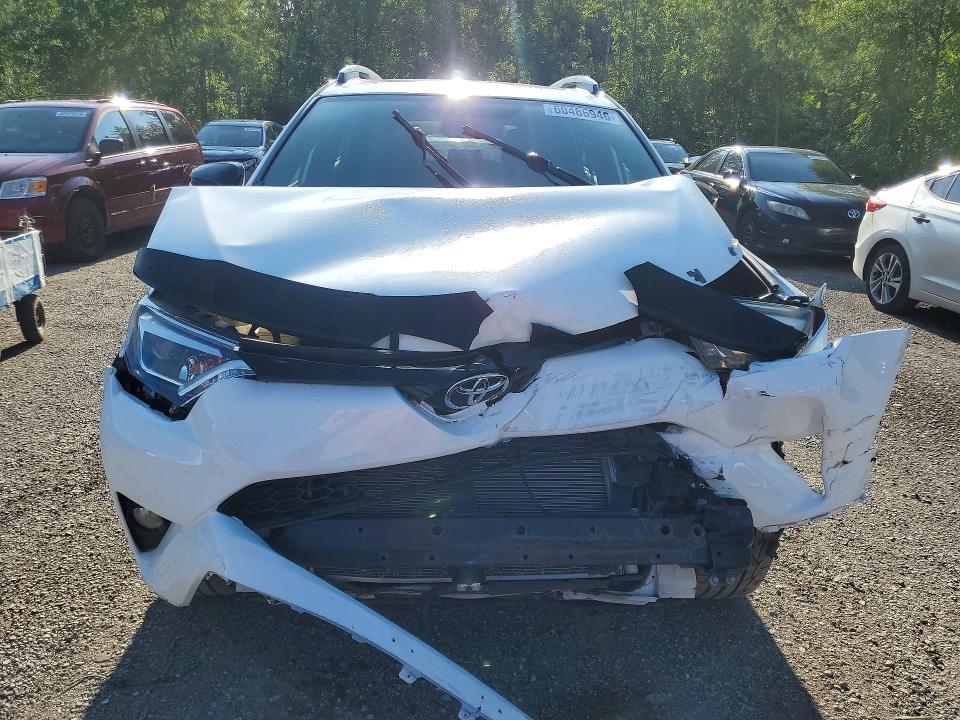 Photo 5 from auction – 2016 TOYOTA RAV4 with VIN 2T3JFREV8GW434796