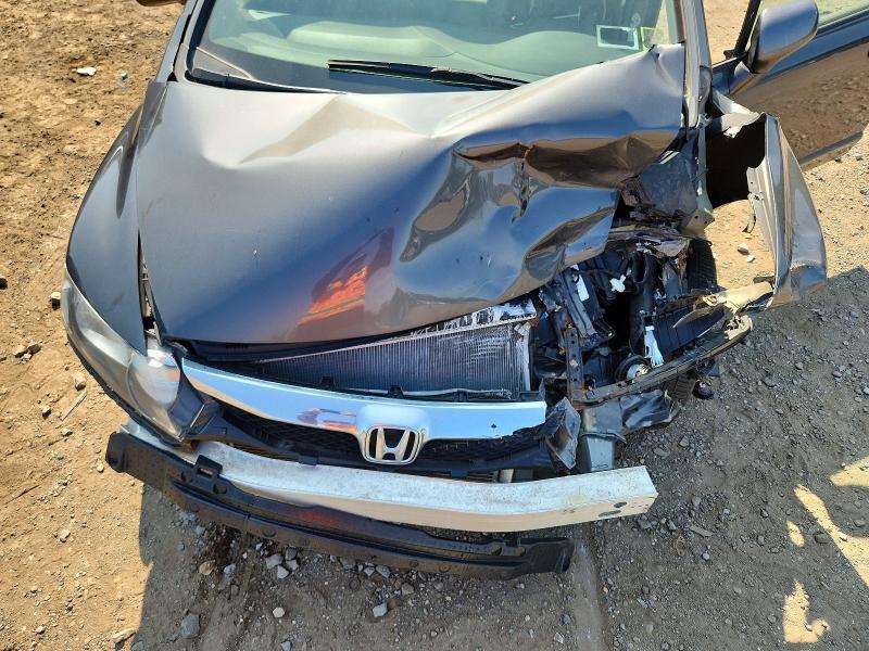 Photo 11 from auction – 2011 HONDA CIVIC with VIN 2HGFA1F96BH503843