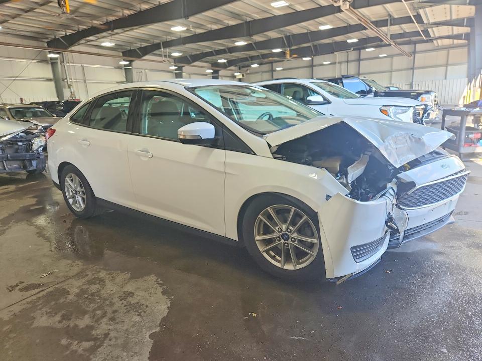 Photo 4 from auction – 2016 FORD FOCUS with VIN 1FADP3F2XGL267975