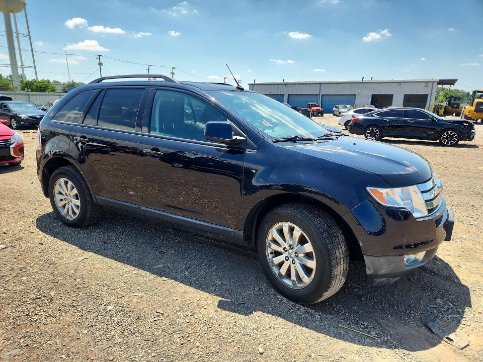 Photo 4 from auction – 2010 FORD EDGE with VIN 2FMDK3JC1ABB02411