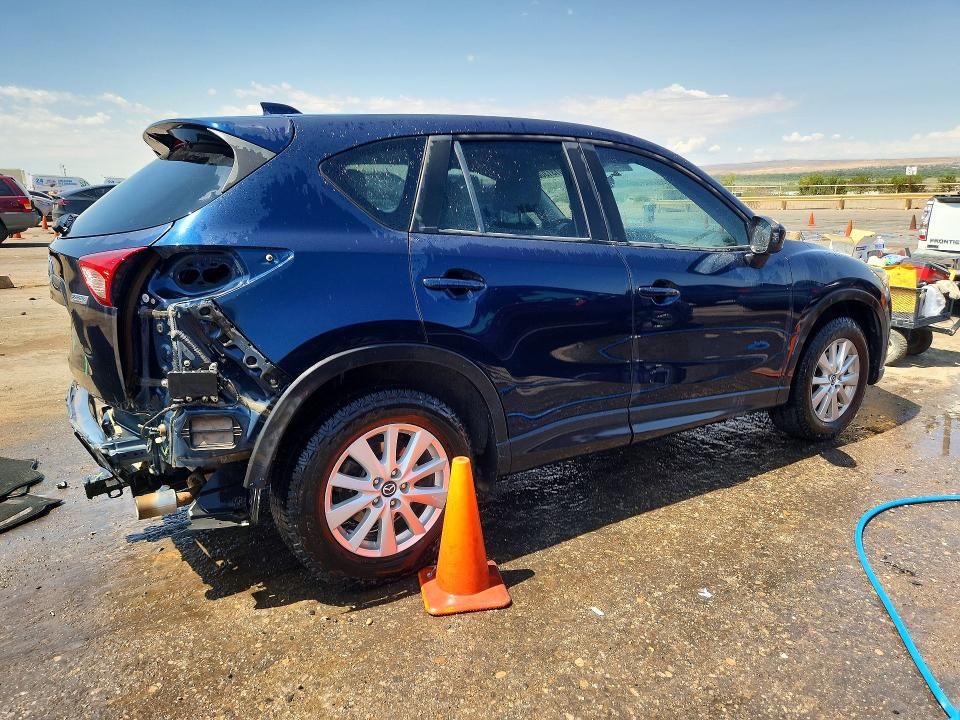 Photo 3 from auction – 2014 MAZDA CX-5 with VIN JM3KE2CY6E0394500