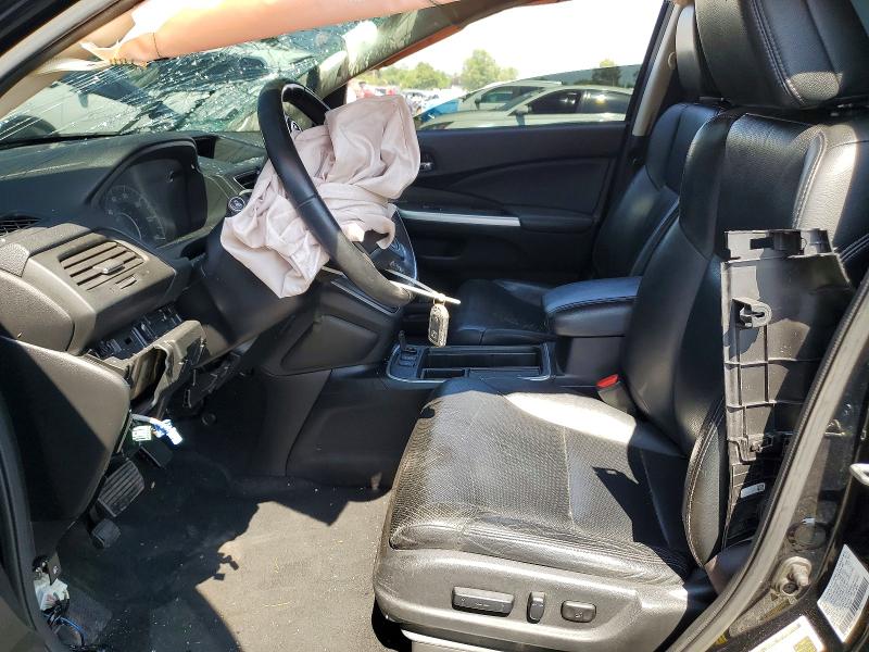 Photo 7 from auction – 2015 HONDA CR-V with VIN 2HKRM4H71FH633669