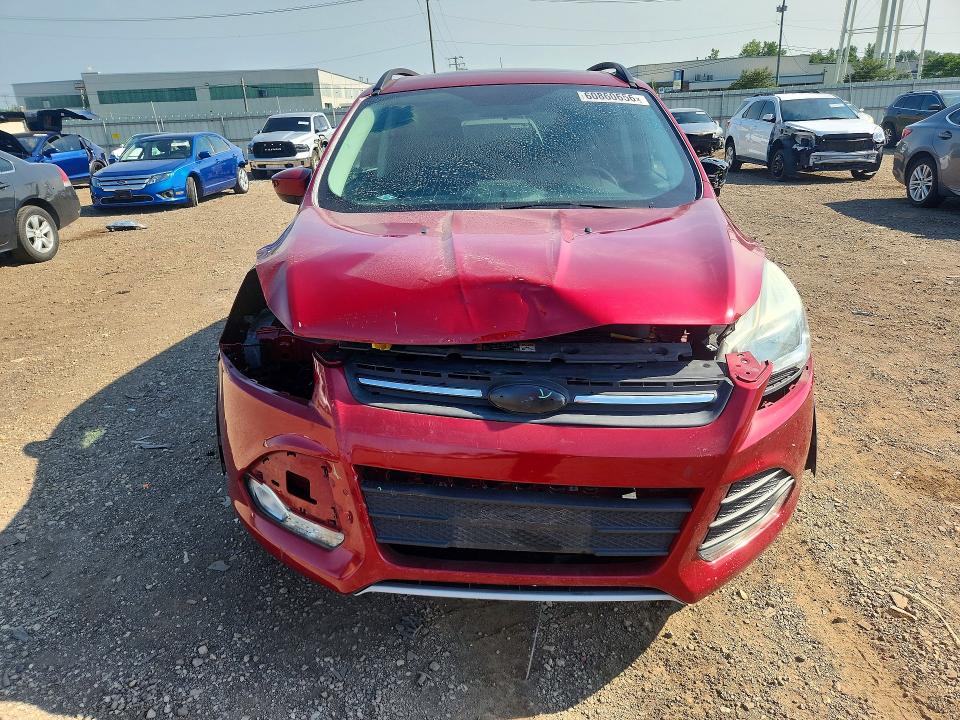 Photo 5 from auction – 2016 FORD ESCAPE with VIN 1FMCU0GX9GUB44522