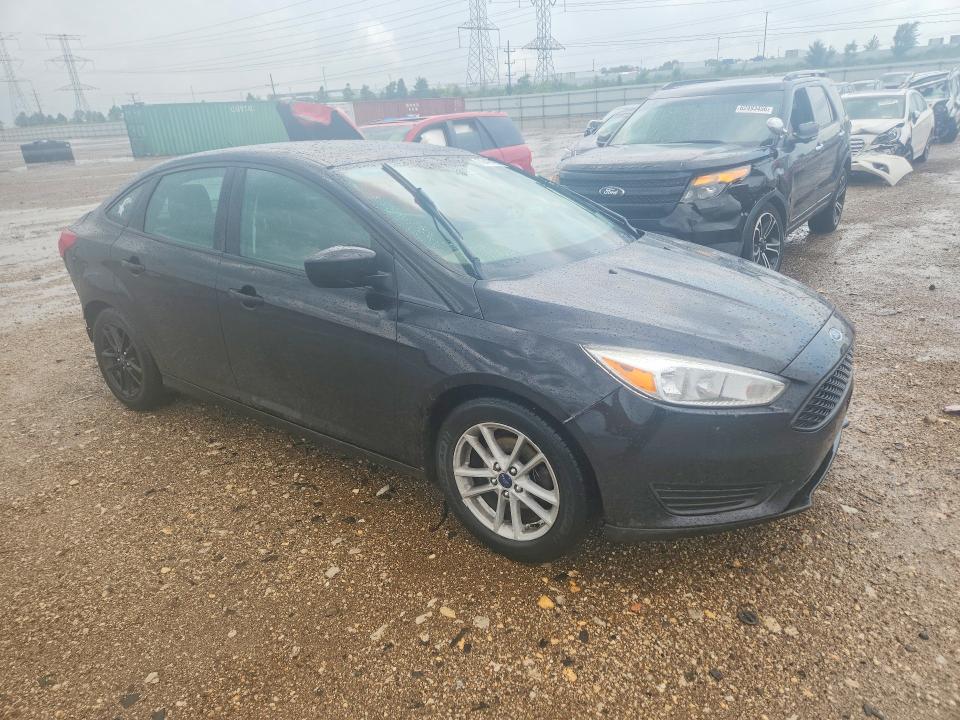 Photo 4 from auction – 2018 FORD FOCUS with VIN 1FADP3F24JL231223