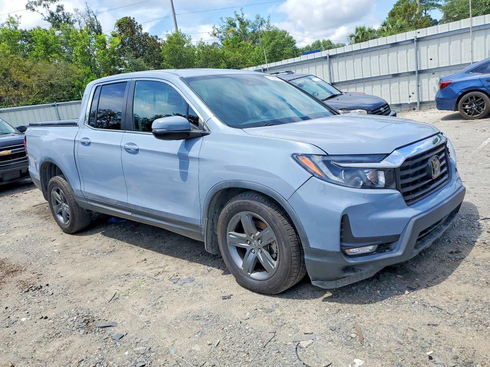 Photo 4 from auction – 2023 HONDA RIDGELINE with VIN 5FPYK3F53PB007724