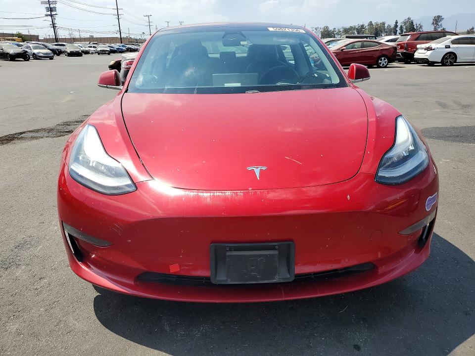 Photo 5 from auction – 2018 TESLA MODEL 3 with VIN 5YJ3E1EA8JF126051
