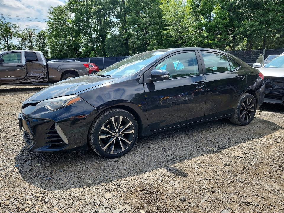 TOYOTA COROLLA 2017 with VIN 2T1BURHE7HC792604 - Photo from auction
