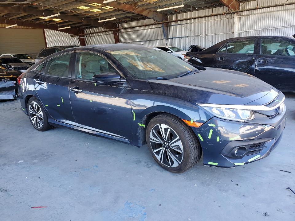 Photo 4 from auction – 2016 HONDA CIVIC with VIN 19XFC1F74GE217886