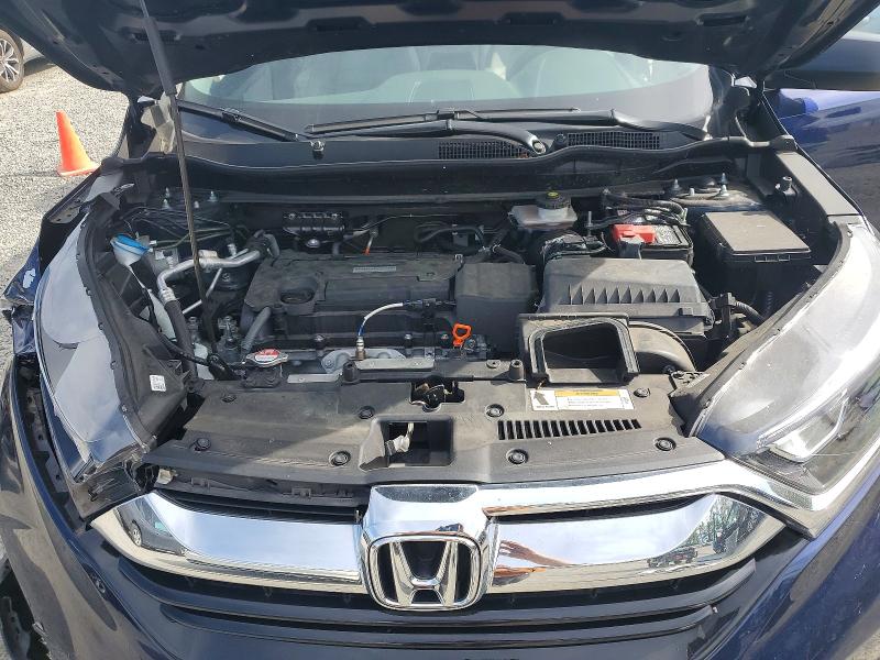 Photo 12 from auction – 2018 HONDA CR-V with VIN 2HKRW6H33JH213455