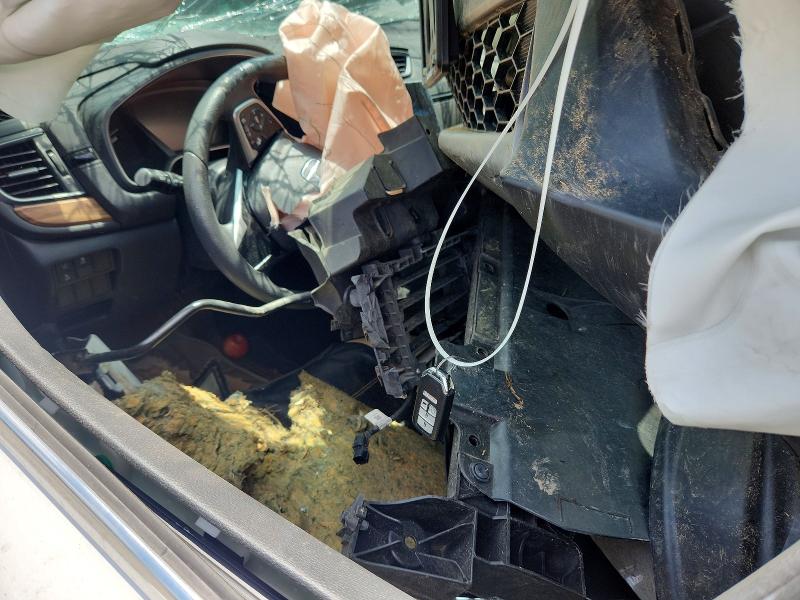 Photo 8 from auction – 2019 HONDA CR-V with VIN 2HKRW2H50KH635128