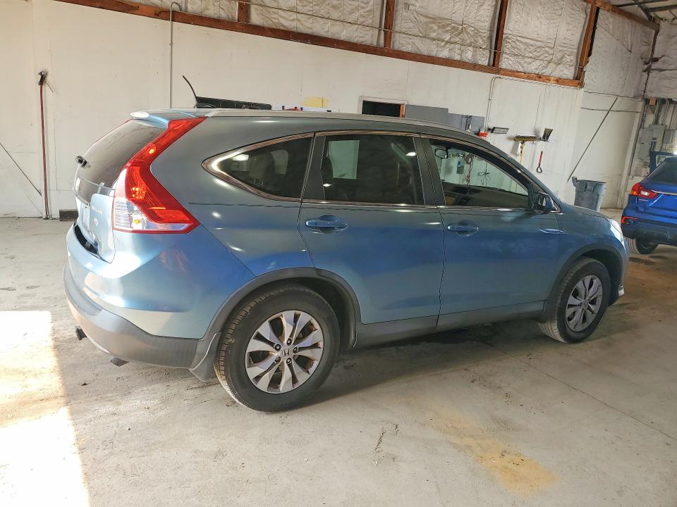 Photo 3 from auction – 2014 HONDA CR-V with VIN 2HKRM3H73EH506558