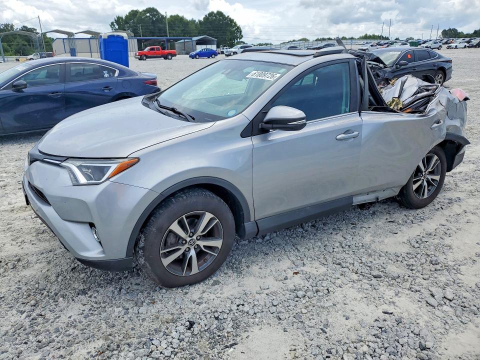 TOYOTA RAV4 2017 with VIN 2T3RFREV1HW670694 - Photo from auction