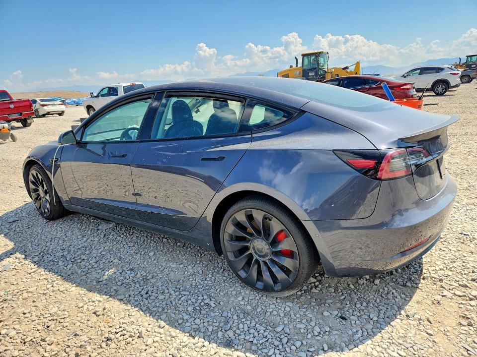 Photo 2 from auction – 2022 TESLA MODEL 3 with VIN 5YJ3E1ECXNF231939