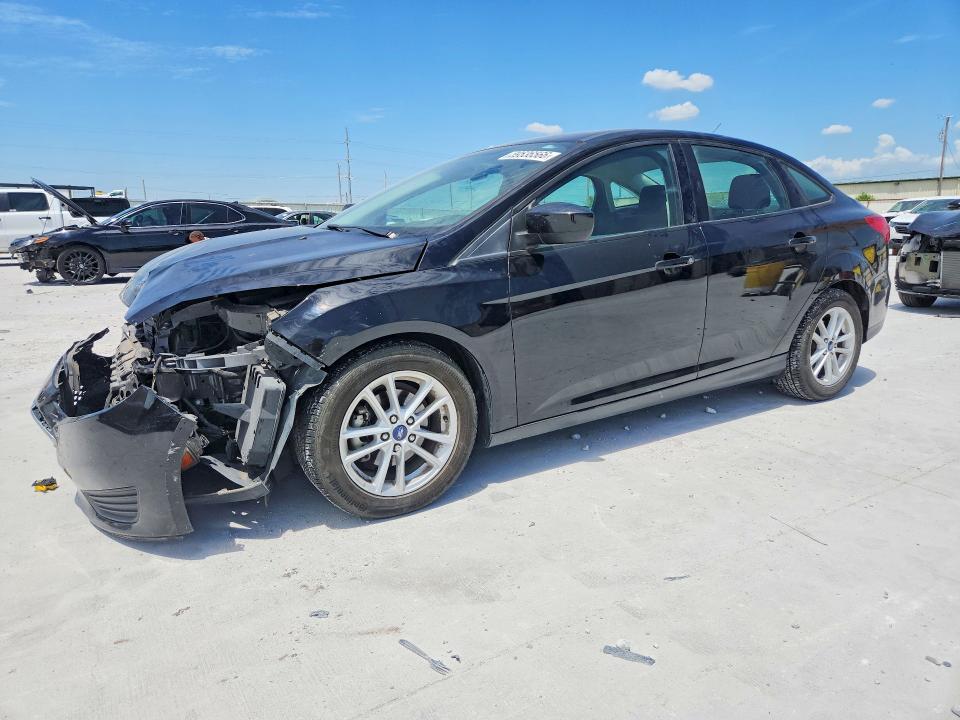 FORD FOCUS 2018 with VIN 1FADP3FEXJL229387 - Photo from auction